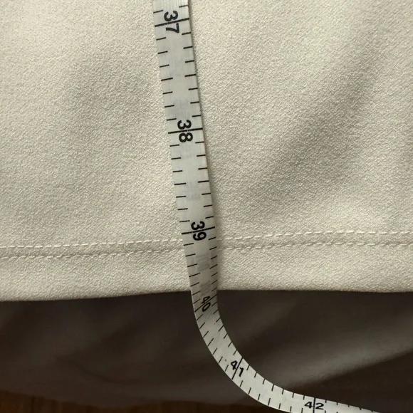 Windsor sleeveless white dress with side split and Cris’s Cris’s in the back. - Picture 4 of 9